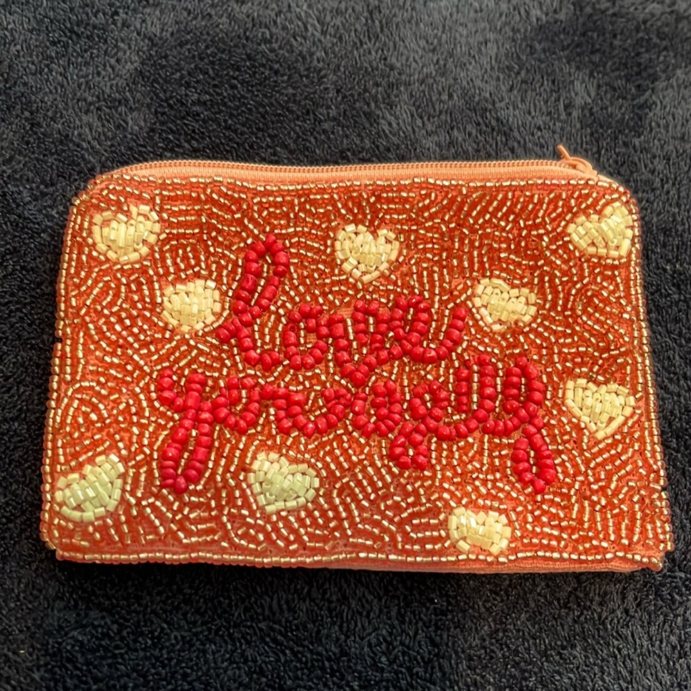 Love Yourself pink pouch